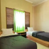 Отель Candi Panggung Family Guest House Syariah, фото 32