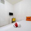 Отель KoolKost near Mercu Buana University, фото 6