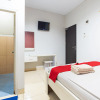 Отель RedDoorz Plus @ Jalan Pumorow Manado, фото 4