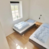 Отель 10 Person Holiday Home in Blavand, фото 6