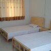 Отель Jujia Fast Hostel в Чжэнчжоу