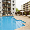 Отель Convenient City Apartment with Pool Gym and Tennis Court, фото 1