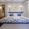 Отель Spectacular 1BR Unit - King Bed, фото 14