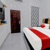 Отель OYO 91203 Naufal Residence Syariah, фото 4