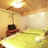 Отель Lijiang Xieyiju Hostel, фото 4