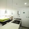 Отель Apartamento Estudio Con 3 Camas Poblado Piso Alto в Медельине