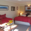 Отель Moanarua Beach Cottage, фото 1
