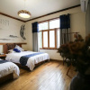 Отель ZhangJiaJie GuoKe Inn, фото 25
