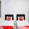 Отель SUPER OYO 91627 Wika Wiki Homestay, фото 6