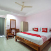 Отель OYO 1065 Greenery House (Vaccinated Staff), фото 6