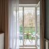 Апартаменты Дом у Дендрария Red Apartments Камелия, фото 10