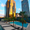 Отель Apartments studio unit whit pool and gym, фото 1