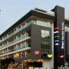 Отель Green Garden Suites Hotel, фото 1