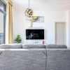 Отель Elite LUX Holiday Homes - Modern 1BR Resort Amenities in Production City, фото 3
