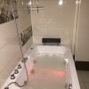 Апартаменты Люкс с джакузи, фото 4