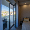 Апартаменты студия с видом на море и город, фото 13