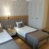 https://cdn.worldota.net/t/{size}/hotel_review/00/e9/00e9d287f51b08ef0d584a3025f21d317098f0cb.JPEG