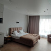 https://cdn.worldota.net/t/{size}/hotel_review/03/ab/03ab4d9d10325dcdf73d243bacfe636b8436e79b.JPEG