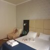 https://cdn.worldota.net/t/{size}/hotel_review/04/34/0434fd13babf8c942b7b55511b11f70cad454385.jpeg