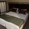 https://cdn.worldota.net/t/{size}/hotel_review/06/d2/06d2c9502e2cb6e3731d1786a1a83a34fceb19f5.jpeg