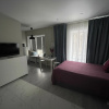 https://cdn.worldota.net/t/{size}/hotel_review/06/e9/06e9fb4deca253598052c273da3c6436f8b4f711.JPEG