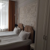 https://cdn.worldota.net/t/100x100/hotel_review/09/ef/09ef292af045834695cb19bec5408e3493ed6076.JPEG