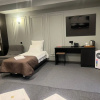 https://cdn.worldota.net/t/{size}/hotel_review/0f/84/0f84c0e7abedc34257cff94c9ead953290daf90b.JPEG