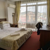https://cdn.worldota.net/t/{size}/hotel_review/12/31/1231eb6849d291293eb2a045efc604abe5cbf8b2.jpeg