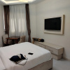 https://cdn.worldota.net/t/{size}/hotel_review/12/81/128145ef8afd8e4495120333eab04981606de01b.JPEG