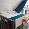 https://cdn.worldota.net/t/100x100/hotel_review/15/0c/150cdfb7ae7381ffb2b0183a3289152519377c93.JPEG