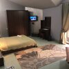https://cdn.worldota.net/t/{size}/hotel_review/19/22/192277291a85f85ca10cc4afcdd13a1018881dd3.JPEG