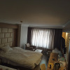 https://cdn.worldota.net/t/{size}/hotel_review/20/99/2099e0fe3568b9a5c5d4baa24ba81965c3bed88f.JPEG