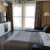 https://cdn.worldota.net/t/100x100/hotel_review/21/1a/211a039a7ca82d376f5763fc50fc0c2fc426f0e2.JPEG