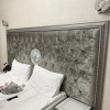 https://cdn.worldota.net/t/{size}/hotel_review/21/59/2159b98a3aea91acfd74c0f08cea971e2814f433.JPEG