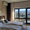 https://cdn.worldota.net/t/{size}/hotel_review/2b/d5/2bd5e69d5ff46df696a92b155356858f27f36ab0.jpeg