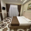 https://cdn.worldota.net/t/{size}/hotel_review/2e/b1/2eb1c307f55af50db48d0aaea9ed9192e5816b7c.JPEG