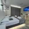 https://cdn.worldota.net/t/100x100/hotel_review/42/74/4274a3dbc540125f9116772b9fa27ee3d7e9c4ea.JPEG
