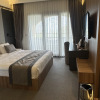 https://cdn.worldota.net/t/{size}/hotel_review/4b/96/4b960521fdf551ff5673d42464f9b20279711810.JPEG