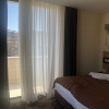 https://cdn.worldota.net/t/{size}/hotel_review/4f/5d/4f5d6d1c173f590ed3b06a931edeb9ce4f4b78ce.JPEG