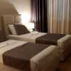 https://cdn.worldota.net/t/{size}/hotel_review/52/64/5264046a033de05f15437f48a7fdc753581524fb.jpeg