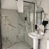 https://cdn.worldota.net/t/100x100/hotel_review/52/cf/52cf8fb48638127cbc6bd2763104f0e67791002c.JPEG
