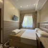 https://cdn.worldota.net/t/{size}/hotel_review/55/5f/555f852e03b5655590b3c1bd0efaf6055cd3d790.JPEG