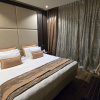 https://cdn.worldota.net/t/100x100/hotel_review/55/f9/55f91335d51b262db954ec64d894a1a57dcacb6c.JPEG