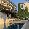 https://cdn.worldota.net/t/100x100/hotel_review/56/3a/563acaead5fa55c53e73d0919ed2583546ab3e10.JPEG