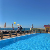 https://cdn.worldota.net/t/100x100/hotel_review/5b/04/5b047b14f0cf8f1c0189ee5e5e591f68d6abdd63.JPEG