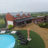 https://cdn.worldota.net/t/100x100/hotel_review/66/07/66074c34ba42bb55c319fa8651f59afc15936e2c.JPEG
