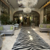 https://cdn.worldota.net/t/100x100/hotel_review/77/9d/779d4e00a4382e7c828bdf9f9dda7bf86c02ea3d.JPEG