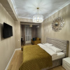 https://cdn.worldota.net/t/100x100/hotel_review/7e/d1/7ed1a290e95396c2b584a0019aea919055c979ca.JPEG