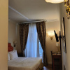 https://cdn.worldota.net/t/100x100/hotel_review/90/63/9063fbfe248cba9b6abeea804d242412c26a324d.JPEG