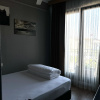 https://cdn.worldota.net/t/100x100/hotel_review/90/64/906427dea6f6822009ad9174f4aa2a342c550e0f.JPEG
